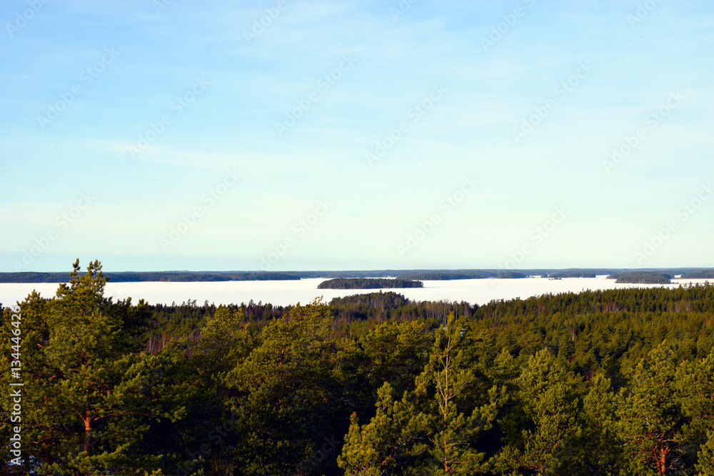 Finland landscape. Forest and frozen sea. A view from Livonsaari, Naantali.