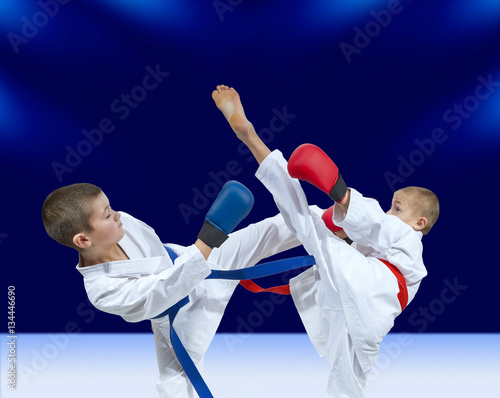 High kicks athletes are beating in karategi