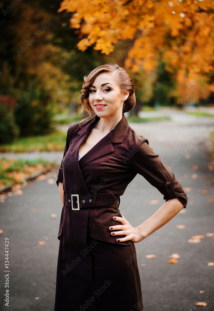 Portrait of smart girl with old-fashioned hairstyle outdoor in b Portrait of smart girl with old-fashioned hairstyle outdoor in b