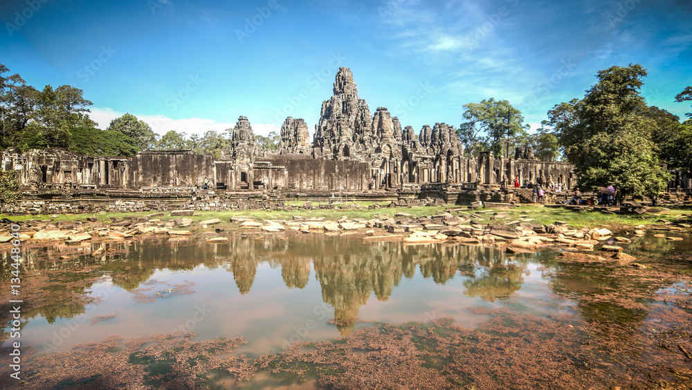 Obraz premium Siem Reap, Cambodia, December 06, 2015: The many face temple of Bayon at the Angkor Wat site in Cambodia