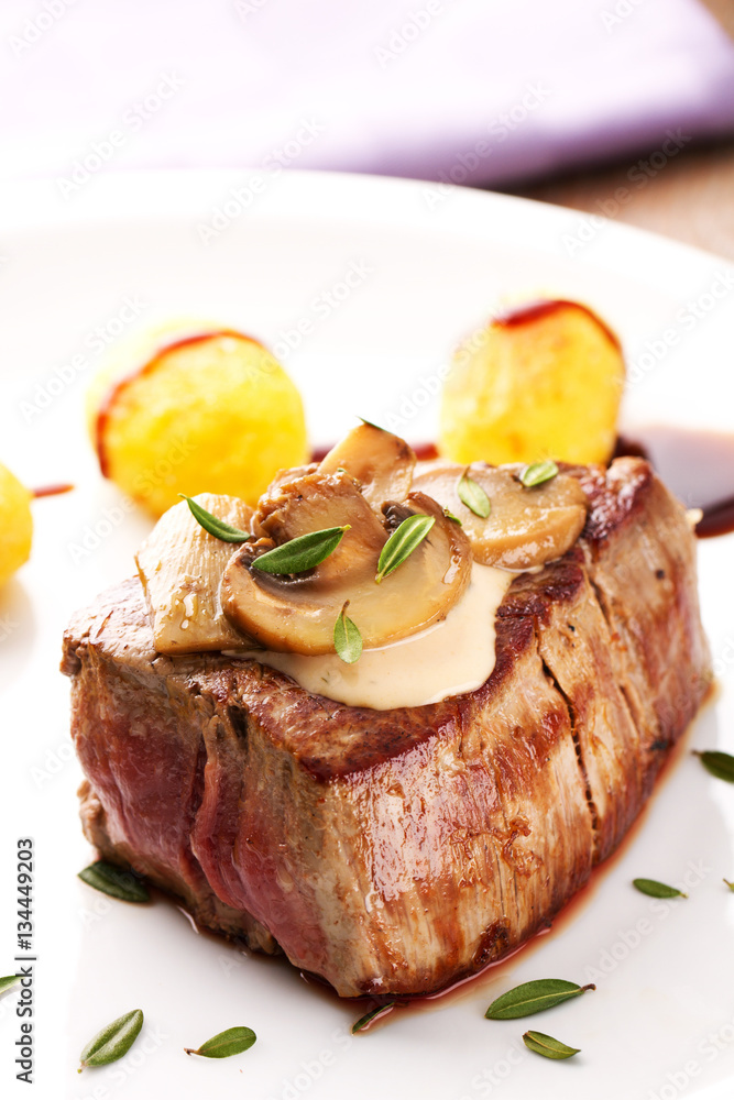 Fillet of beef with mushroom sauce and potatoes Fillet of beef with mushroom sauce and potatoes