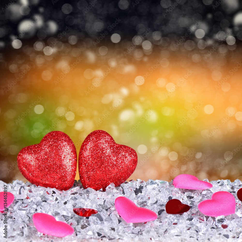The two red hearts shapes on abstract dark bokeh background in love concept for valentines day and romantic moment The two red hearts shapes on abstract dark bokeh background in love concept for valentines day and romantic moment
