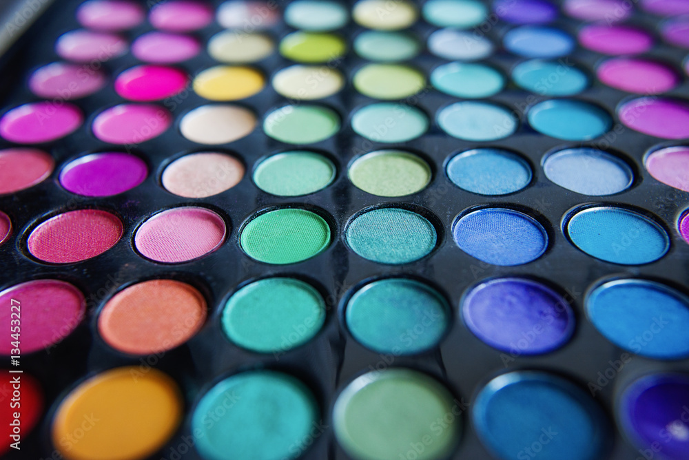 Palette of colorful eye shadows and make up brush Palette of colorful eye shadows and make up brush