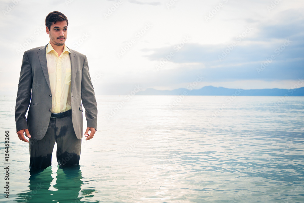 Businessman Knee-deep In Water Businessman Knee-deep In Water