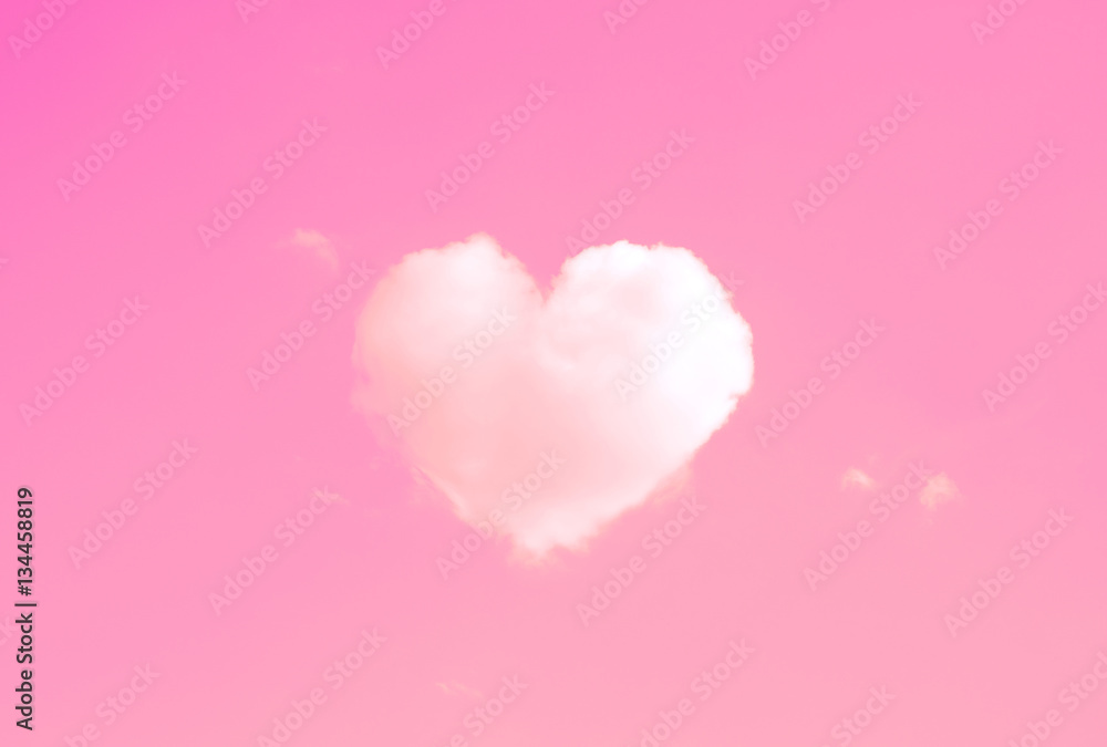 Beautiful clouds in heart shape on pink sky in Vintage style for Happy valentines day or wedding concept and copy space.