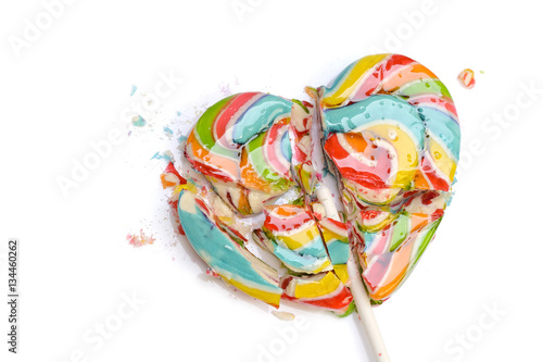 Colorful retro style heart shape lollipop isolated on white back