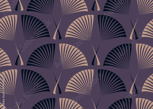 Seamless tile with a retro style pattern of palm leaves in purple