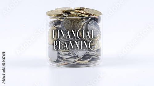 Картината върху платно Saving concept with coins in the glass jar