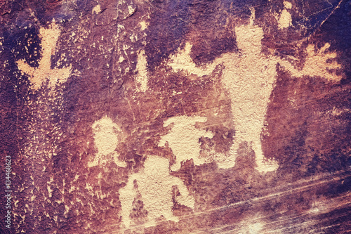 Color toned petroglyphs, ancient culture background, Dinosaur National Monument, Utah, USA.