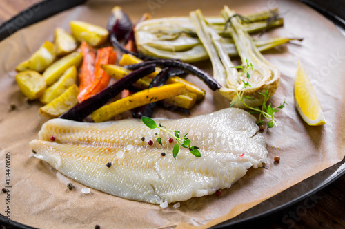 baked fish and vegetables from the oven