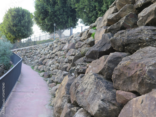 Retaining wall from rough granite blocks