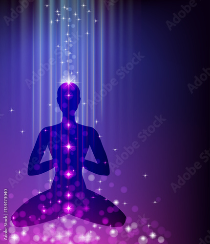 Man in yoga pose - padmasana.