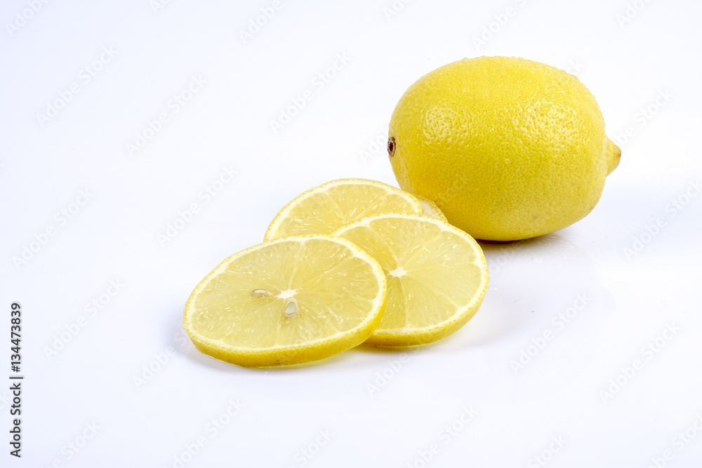 Fresh ripe lemons. Isolated on white background. Top view Fresh ripe lemons. Isolated on white background. Top view
