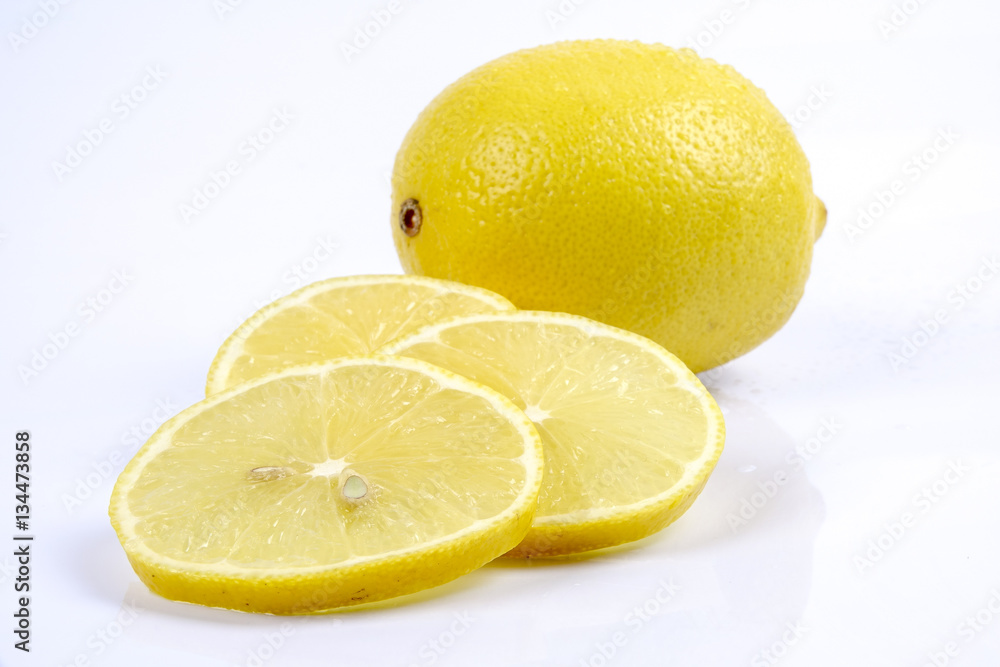Fresh ripe lemons. Isolated on white background. Top view Fresh ripe lemons. Isolated on white background. Top view