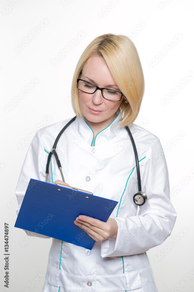 Smiling medical doctor woman with stethoscope. Isolated over white background Smiling medical doctor woman with stethoscope. Isolated over white background