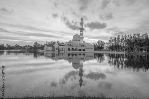 Reflections of Tengku Tengah Zaharah Mosque (floating mosque), Kuala Ibai Terengganu, Malaysia photo