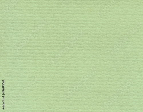 Highly-textured watercolor paper. Colored green.