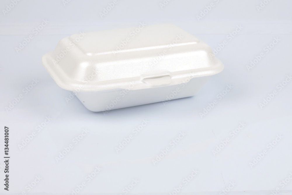 unhealthy polystyrene lunch boxes with take away meal isolated on white background. unhealthy polystyrene lunch boxes with take away meal isolated on white background.