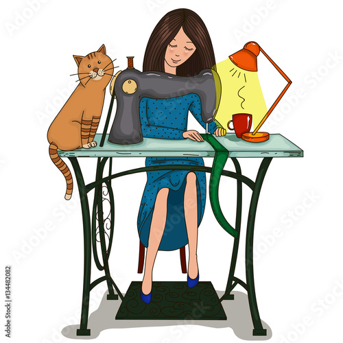 Woman sews on the sewing machine.