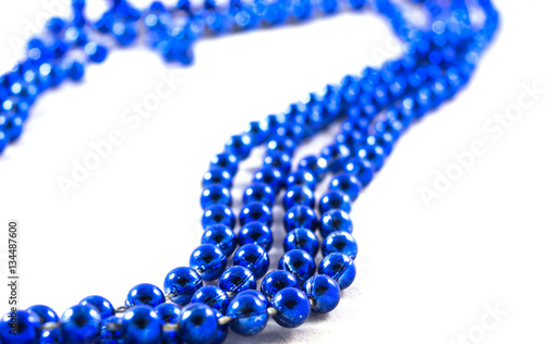 blue beads on white background