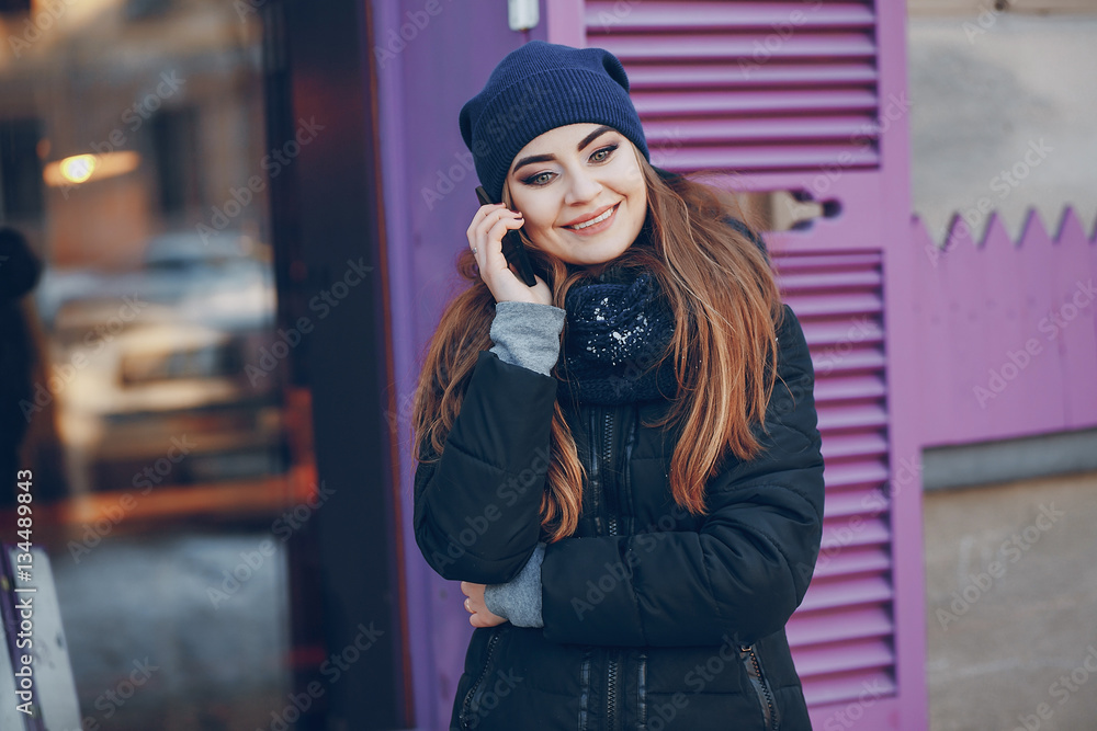 girl walking in a winter city girl walking in a winter city