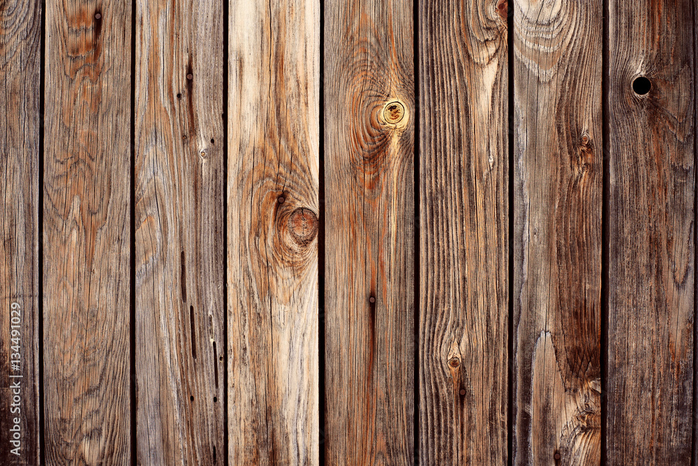 Naklejka premium Wooden background old wall of vertical planks