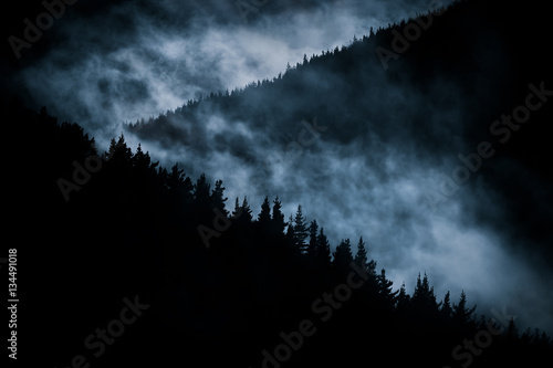 scary foggy mountain at nigh