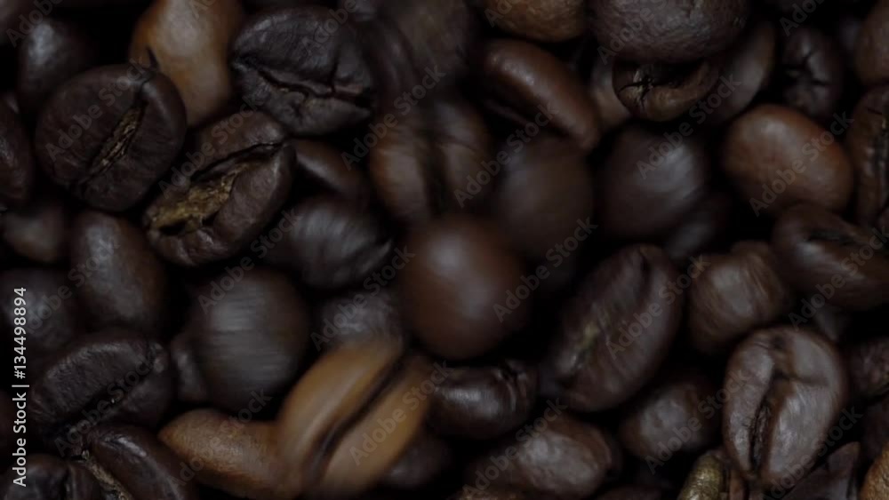 Rotating and falling Coffee beans Rotating and falling Coffee beans