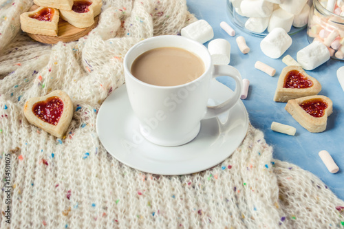 cocoa with marshmallows and a cookie heart. Selective focus.   photo