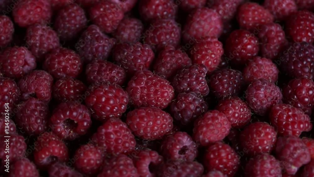 Rotating ripe raspberry. Turning closeup berries Rotating ripe raspberry. Turning closeup berries
