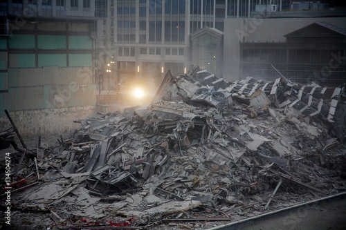 Fotografie, Tablou Building demolition with explosives	in downtown city center