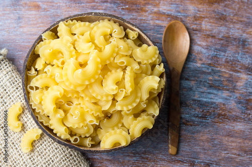 creste di gallo pasta with a wooden spoon photo