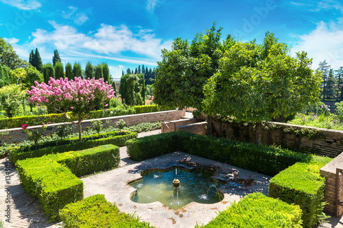 Gardens and fountains in Alhambra palace photo