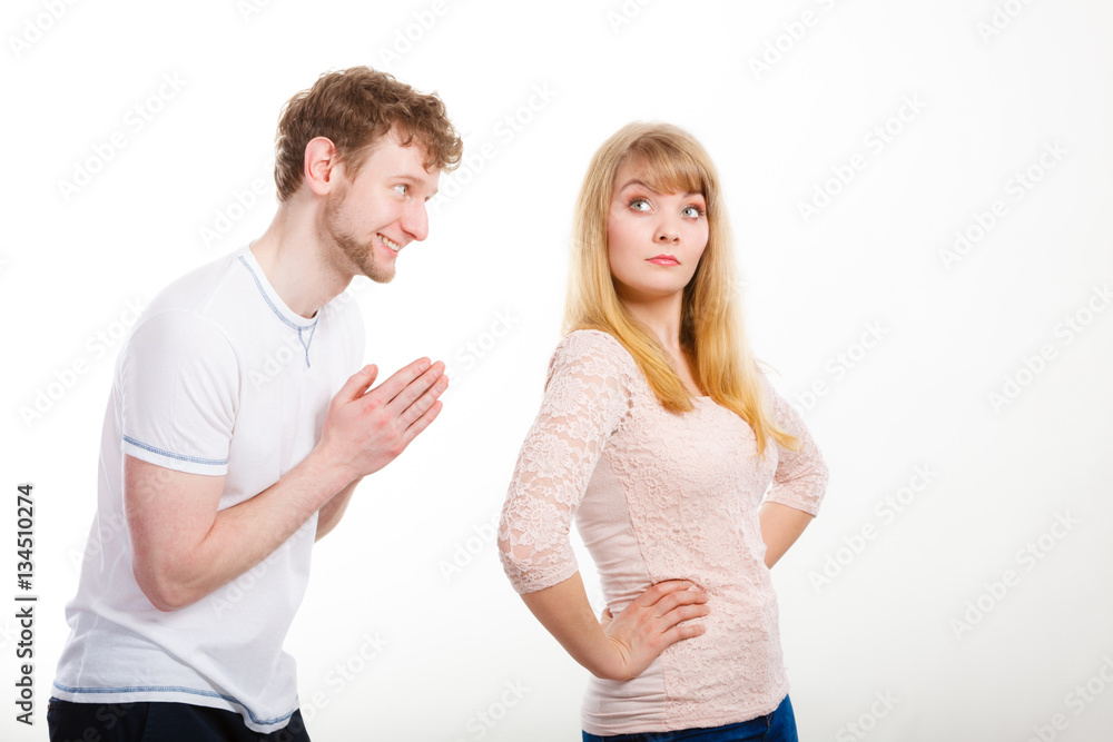 Woman angry on man apologizing her. Woman angry on man apologizing her.