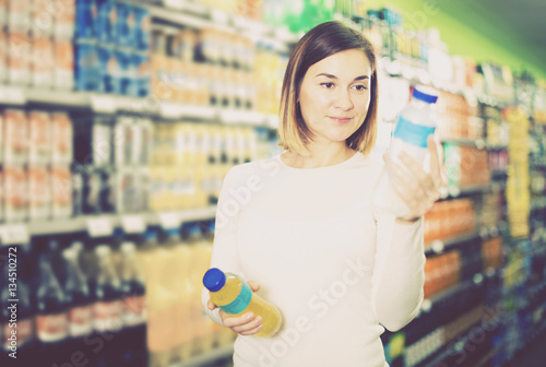 female shopper searching for beverages