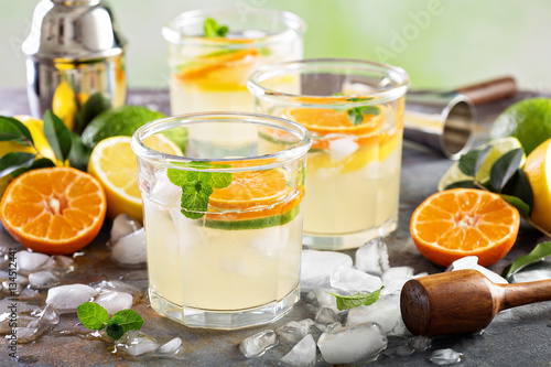 Refreshing summer cocktail with citrus fruits