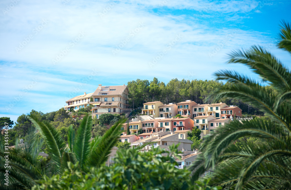 Houses in the green mountain hills.