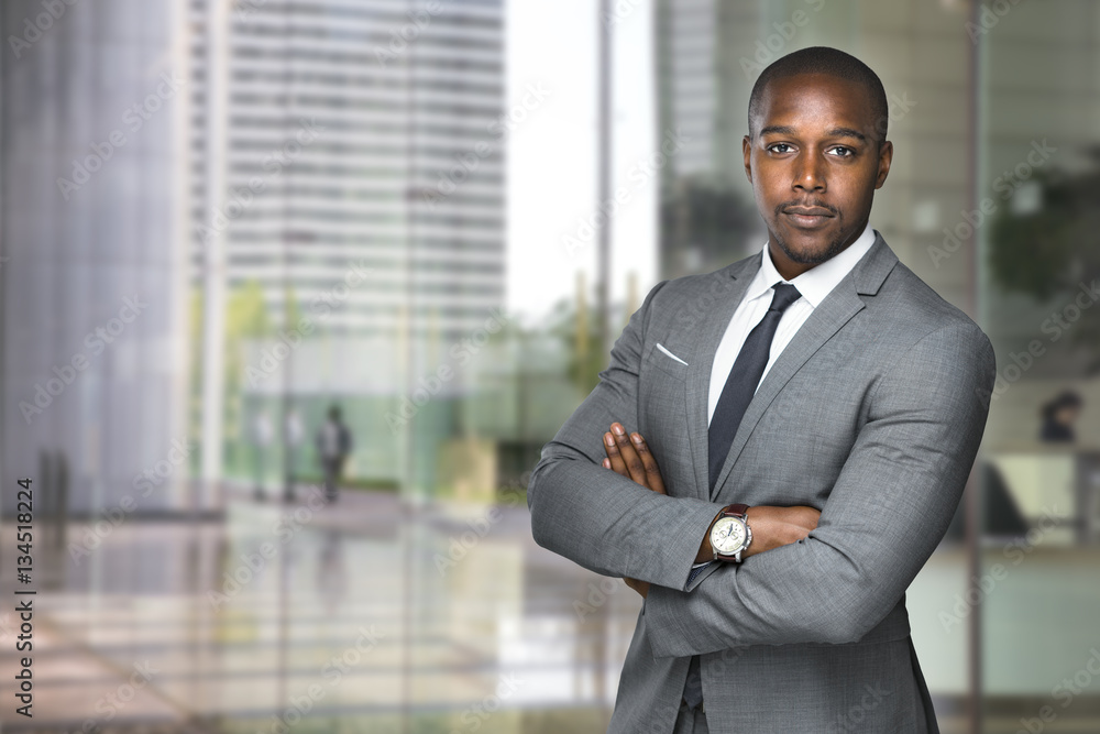 Successful black business man ceo downtown workspace proud confident arms crossed Successful black business man ceo downtown workspace proud confident arms crossed