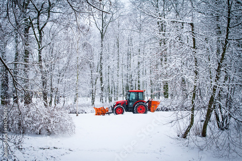 Red Tractor in cold winter lanscape