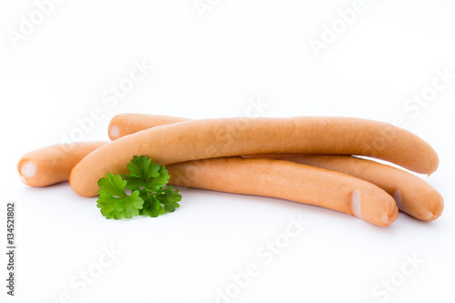 Wiener sausages on the white background.