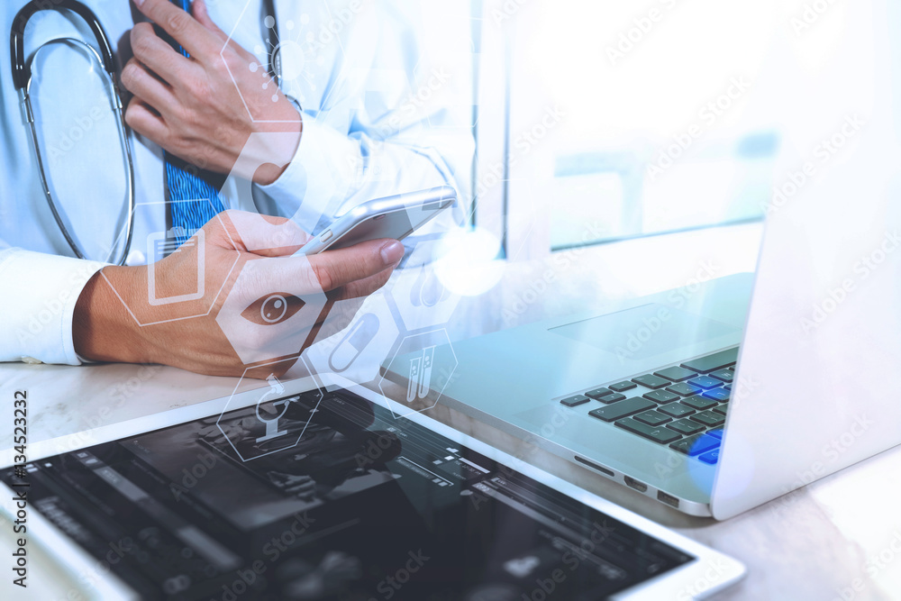 medical doctor hand working with smart phone,digital tablet comp medical doctor hand working with smart phone,digital tablet comp