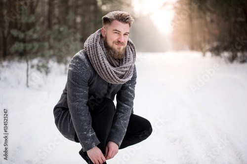 Tableau sur toile Tying winter shoes