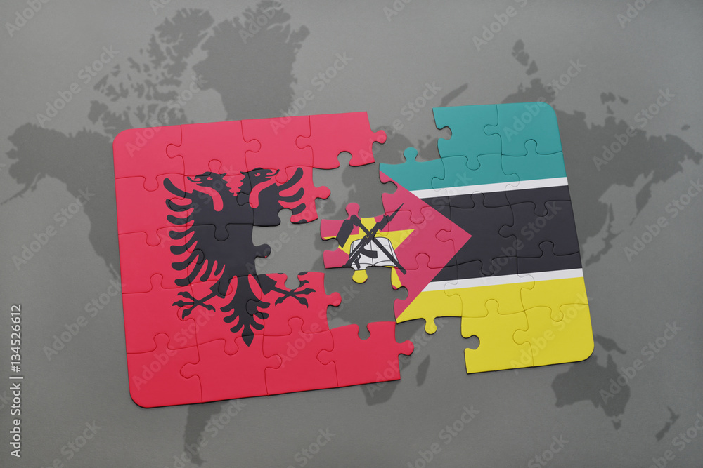 puzzle with the national flag of albania and mozambique on a world map ...