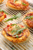 Small Pizza with mozzarella Cheese, ham and arugula
