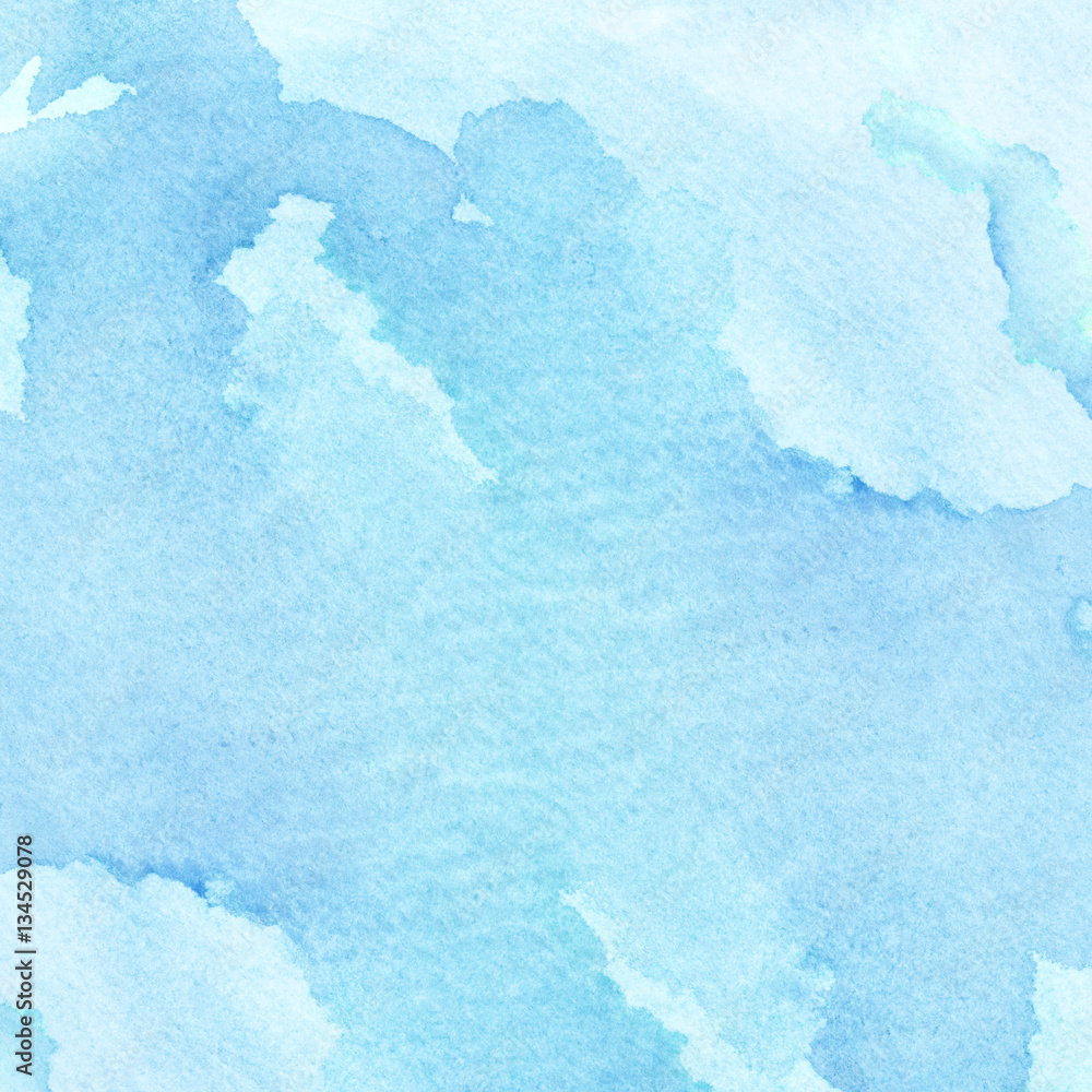 Abstract hand drawn watercolor background on textured paper in blue shades