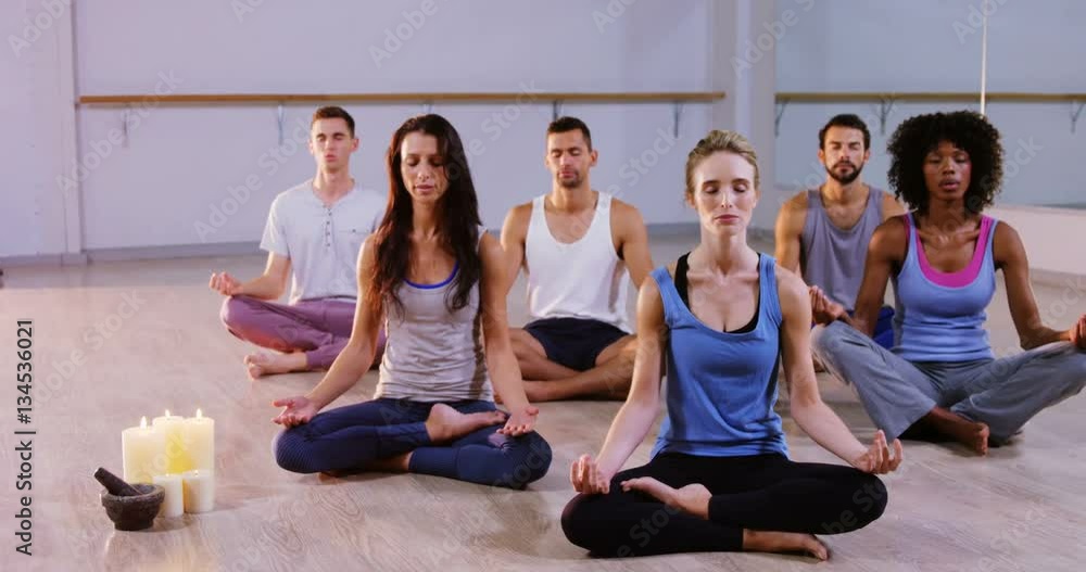 Group of people performing yoga in fitness studio 4k Group of people performing yoga in fitness studio 4k