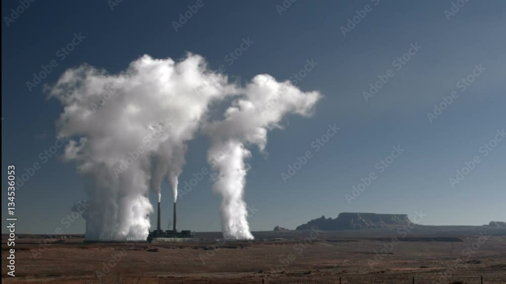 Steam Rises from Desert Power Plant Cooling Towers Steam Rises from Desert Power Plant Cooling Towers