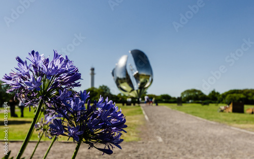 Blurred floralis generica sculpture monument in Buenos Aires, Argentina photo