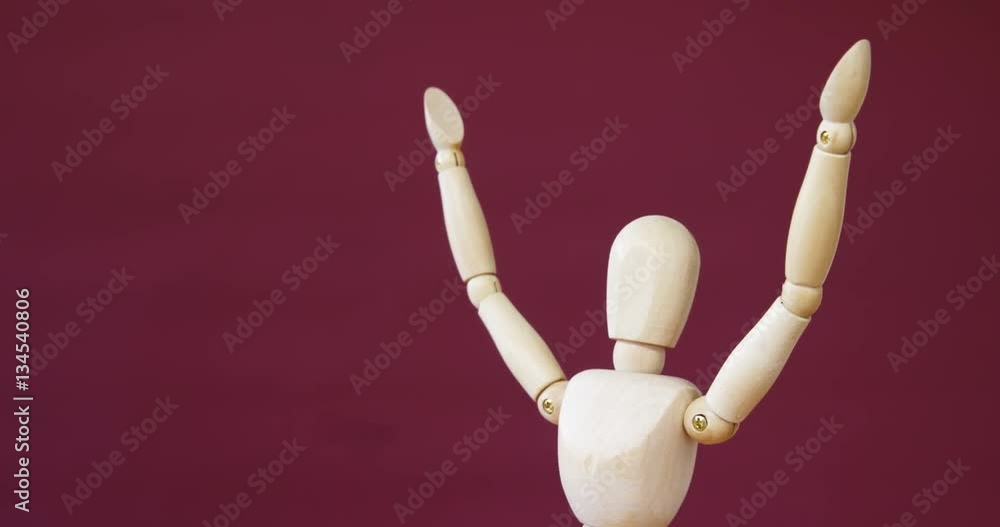 Conceptual image of figurine standing with arms up 4k Conceptual image of figurine standing with arms up 4k
