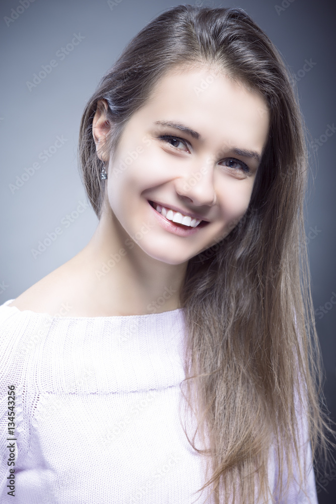 Natural Portrait of Sensual Smiling Caucasian Brunette Woman With Beautiful Smile Against Black Natural Portrait of Sensual Smiling Caucasian Brunette Woman With Beautiful Smile Against Black